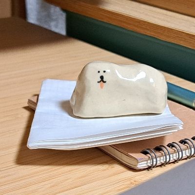 ま